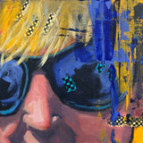 Closeup of sunglasses on a woman's face with hair moving in the wind and collage bits adding texture to the surface. By Laura Hunt.