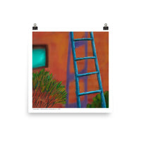 A blue handmade ladder rests against an adobe wall, casting a purple shadow. By Laura Hunt.