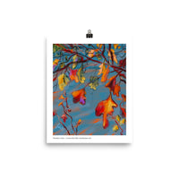 Oak leaves in orange, yellow, gold, purple green and yellow cling to the tree. By Laura Hunt